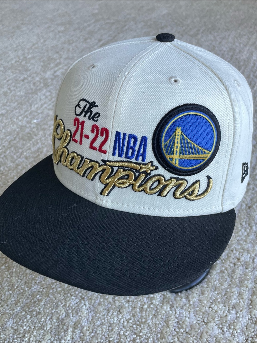 Golden State Warriors 2022 NBA Champions New Era Snapback Hat White Gold Curry